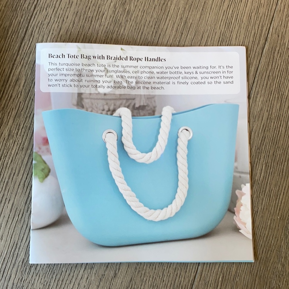 Brand new silicone tote bag. New in bag.